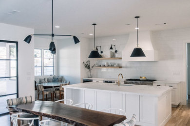 Example of a transitional dining room design in Dallas