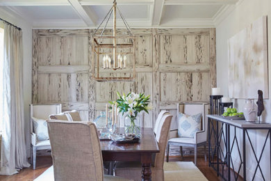 Inspiration for a large coastal medium tone wood floor and brown floor enclosed dining room remodel in Birmingham with beige walls and no fireplace
