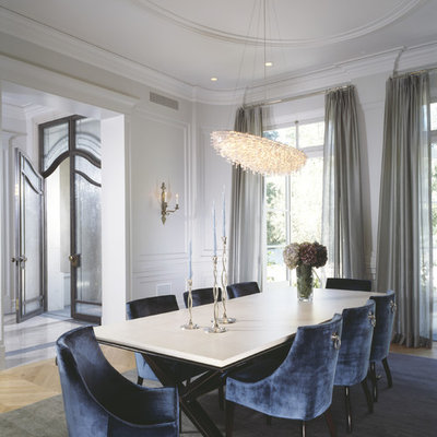 Transitional dining room photo in Los Angeles with white walls