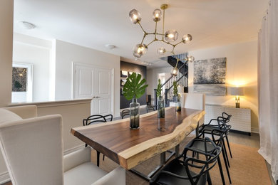 Inspiration for a large contemporary light wood floor and gray floor great room remodel in Toronto with white walls