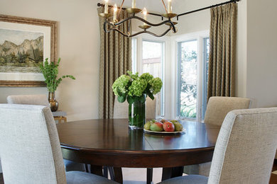 Dining room - transitional medium tone wood floor dining room idea in Orange County