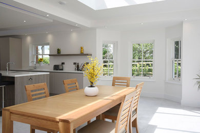 Design ideas for a contemporary dining room in Hampshire.