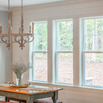 Windows allow natural light in dining room