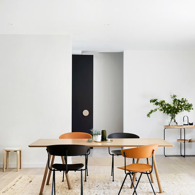 Inspiration for a mid-sized contemporary light wood floor great room remodel in Melbourne with white walls