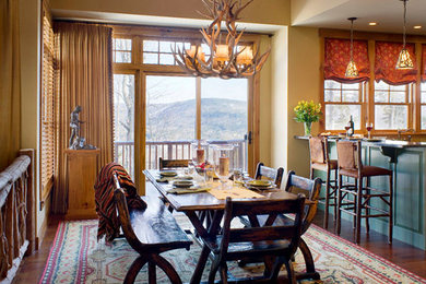 Example of an arts and crafts dining room design in Burlington