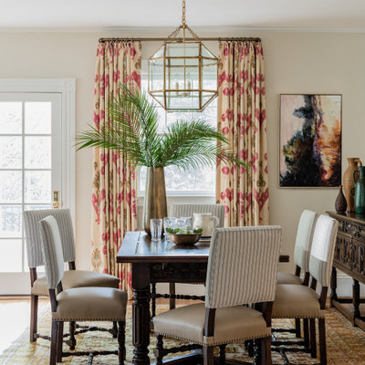 Mid-sized transitional light wood floor and brown floor kitchen/dining room combo photo in Boston with white walls