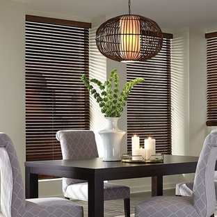 Inspiration for a small tropical open plan dining in Other with white walls and no fireplace.