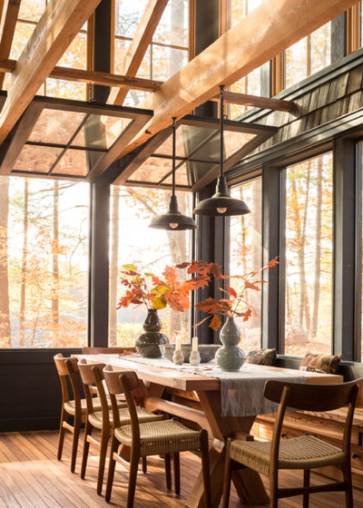 Rustic Dining Room by Winkelman Architecture