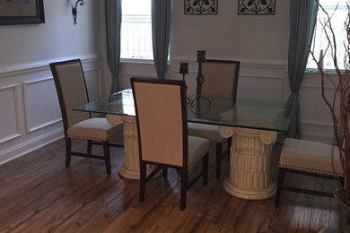 Inspiration for a large transitional laminate floor enclosed dining room remodel in Charleston with beige walls