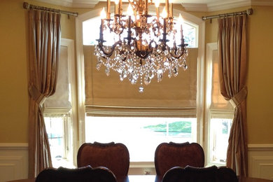 Inspiration for a timeless medium tone wood floor kitchen/dining room combo remodel in New York with beige walls