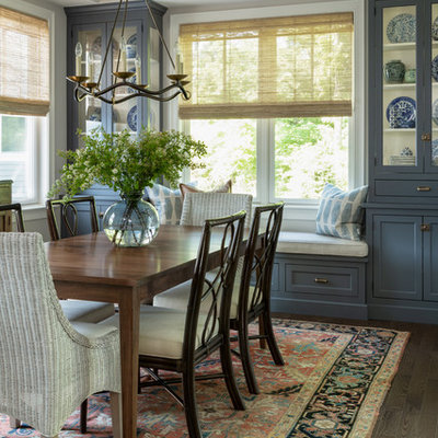 Elegant dark wood floor and brown floor enclosed dining room photo in Boston with gray walls