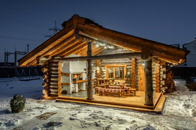 Example of a mountain style exterior home design in Moscow