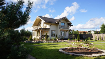 Дом из клееного бруса с дивным садом