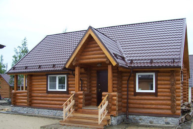 Пример оригинального дизайна: одноэтажный, деревянный дом в современном стиле