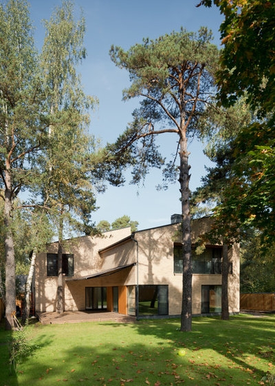 Современный Фасад дома by Gikalo Kuptsov Architects