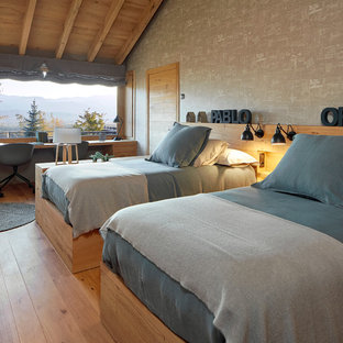 Design ideas for a large country kids' room for boys in Other with light hardwood floors, grey walls and brown floor.