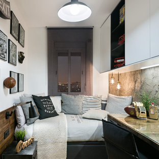 Design ideas for a contemporary kids' bedroom in Barcelona with white walls and light hardwood flooring.