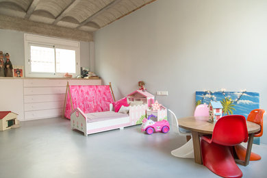Diseño de dormitorio infantil de 1 a 3 años ecléctico de tamaño medio con paredes azules
