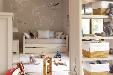 Habitacion infantil con mural mapamundi