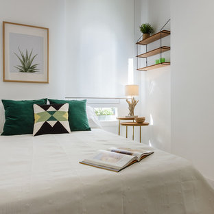 Diseño de dormitorio nórdico con paredes blancas