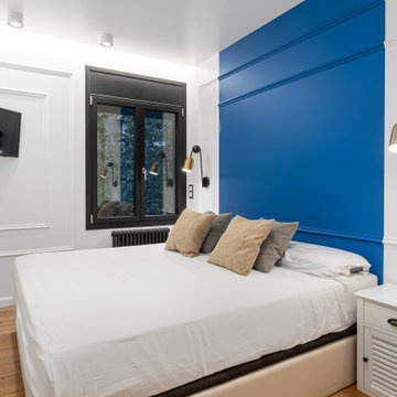 Dormitorio azul y blanco