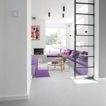 Lounge gestaltet in gespachteltem Betonlook-Boden