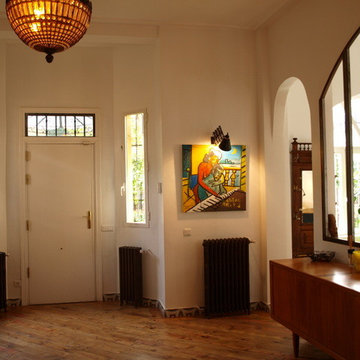 Obra y decoración salón y hall vivienda unifamiliar en madrid