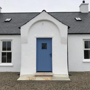A striking blue door tied in with the rural cottage theme