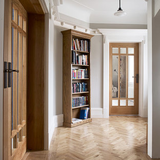 Photo of a traditional foyer in Cheshire with grey walls, light hardwood flooring, a double front door, a grey front door and beige floors.