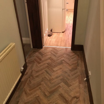 Camaro Luxury Vinyl Tile Parquet Flooring to a Hallway