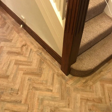 Camaro Luxury Vinyl Tile Parquet Flooring to a Hallway