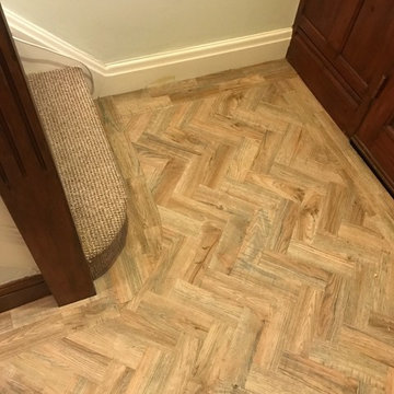 Camaro Luxury Vinyl Tile Parquet Flooring to a Hallway