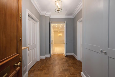 Design ideas for a medium sized victorian hallway in London with a single front door.