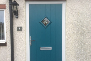 Design ideas for a traditional front door in Other with a single front door and a blue front door.