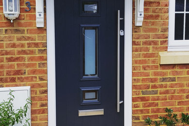 Modern front door in Surrey with a single front door and a grey front door.