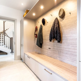 Design ideas for a traditional boot room in Berkshire with white walls and white floors.