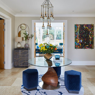 Design ideas for a large contemporary foyer in Surrey with beige walls and beige floors.