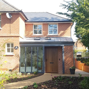 Semi-detached house two storey side extension, basement and garage.