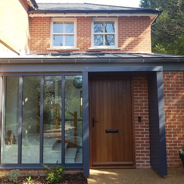 Semi-detached house two storey side extension, basement and garage.