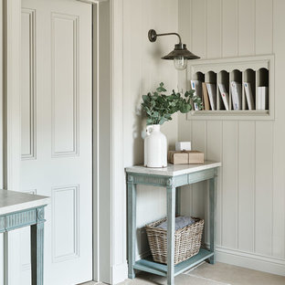 Photo of a classic entrance in Wiltshire with grey walls and beige floors.