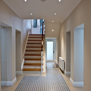 The halls of the original flats were combined to create the lower entrance hall.