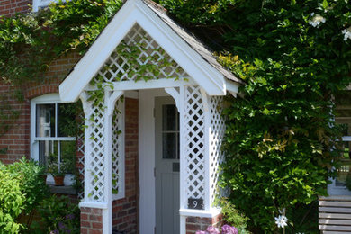 Design ideas for an entrance in Hampshire with a single front door and a grey front door.