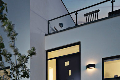 Inspiration for a modern entrance in Malmo with a single front door.