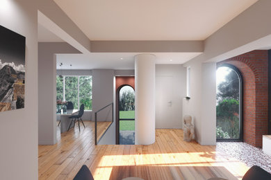 Diseño de distribuidor actual de tamaño medio con paredes blancas, suelo de terrazo, puerta pivotante, puerta metalizada y suelo multicolor