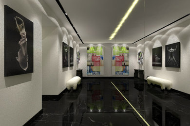 Foto de distribuidor contemporáneo extra grande con paredes grises, suelo de mármol, puerta simple y suelo negro