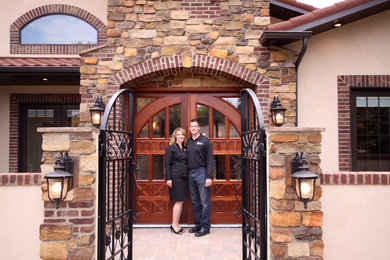 Example of a tuscan entryway design in Other