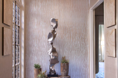 Inspiration for a mid-sized transitional limestone floor vestibule remodel in San Francisco with metallic walls