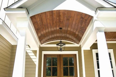 Inspiration for a mid-sized transitional entryway remodel in Atlanta with a medium wood front door