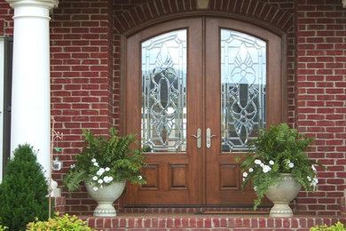 Design ideas for a classic front door in Cincinnati with a double front door and a medium wood front door.