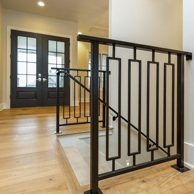 Inspiration for a mid-sized transitional light wood floor entryway remodel in Other with gray walls and a blue front door